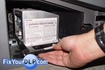 Toshiba lamp enclosure door